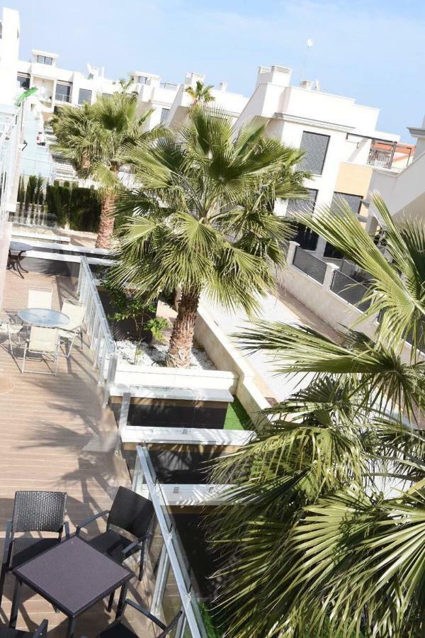 Отель La Zenia Beach Bungalow Ориуэла Экстерьер фото